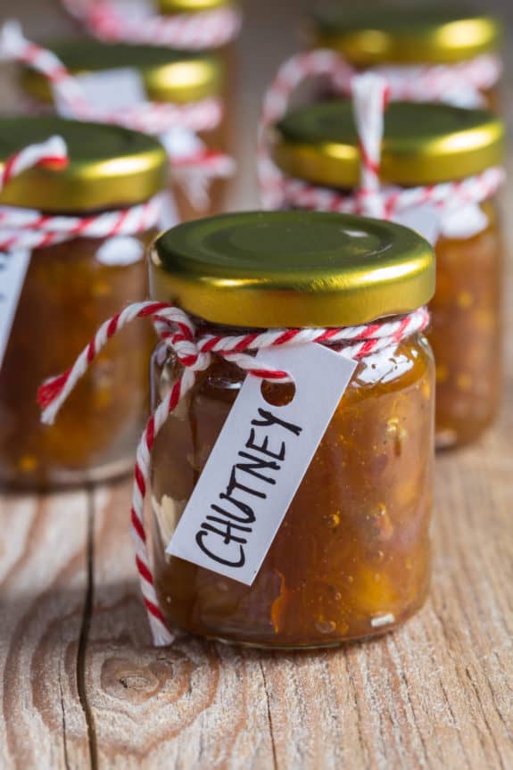 Onion pineapple chutney on rustic wood