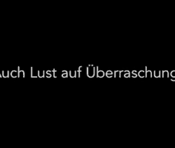 Schwarzer Hintergrund mit weißem Text: 'Auch Lust auf Überraschungen?' und MasterCard-Logo unten rechts.